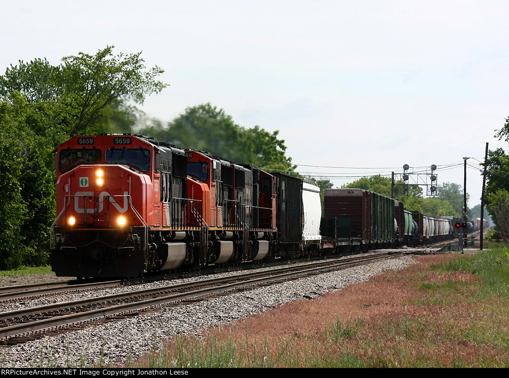 M397 heads west behind three SD75I's